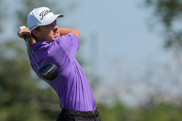 Justin Hastings, of the Cayman Islands, watches his tee shot on the third hole during the final round of the Mexico Open golf tournament in Puerto Vallarta, Mexico, Sunday, Feb. 23, 2025. (AP Photo/Fernando Llano)