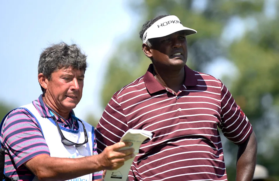 Vijay Singh (right) and his caddie Cayce Kerr at the 6th tee during the third round of the 2015 Barclays at Plainfield Country Club.
