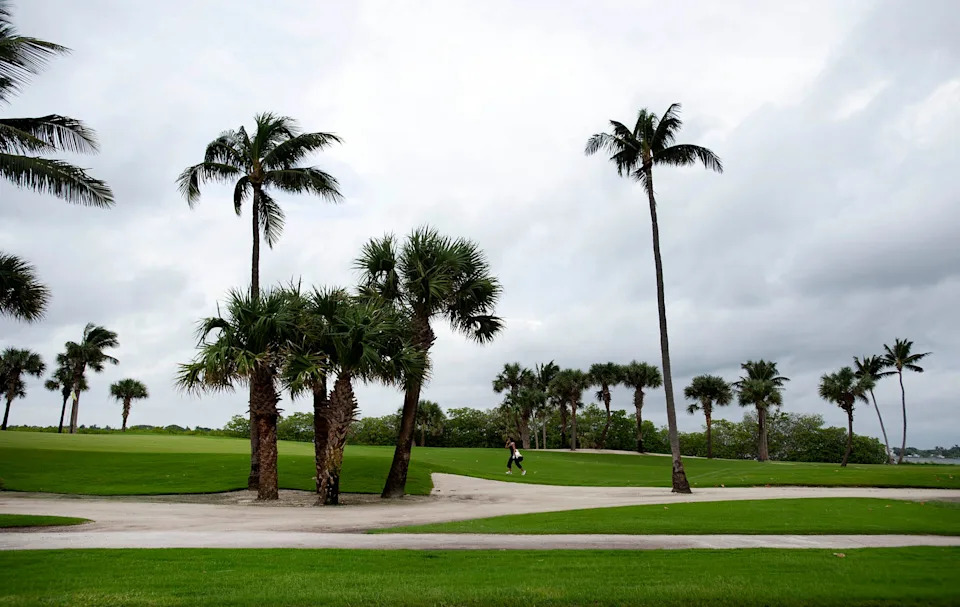 A golfer gets in some practice at The Par 3 golf course in Palm Beach in October 2024.