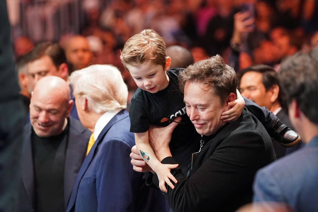 Elon Musk and his son standing with U.S President Donald Trump and Dana White, CEO of the Ultimate Fighting Championship, at UFC 314, Kaseya Center, Miami Florida