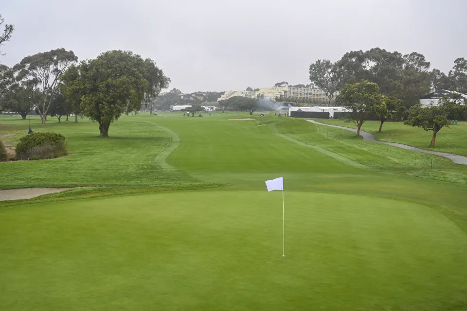 SAN DIEGO, CALIFORNIA - FEBRUARY 13:  A white pin-flag flies on the seventh hole in honor of Kultida Woods, the late mother of Tiger Woods, during the first round of The Genesis Invitational on the South Course at Torrey Pines Golf Course on February 13, 2025 in San Diego, California. (Photo by Ben Jared/PGA TOUR via Getty Images)