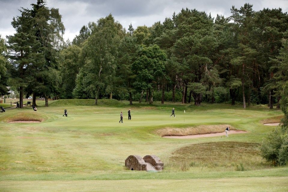 General view of the 17th green during a golf tournament.