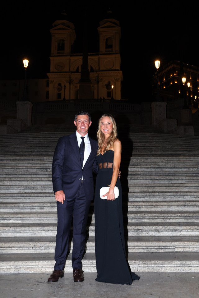 Rory McIlroy and his wife Erica Stoll posing on the Spanish Steps in Rome.