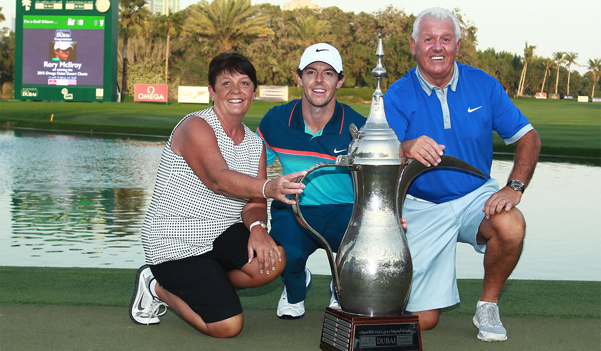 Rory Mcilroy of Northern Ireland Celebrates with His Mother Rosie Mcilroy and Father Gerry Mcilroy After Winning the Omega Dubai Desert Classic 2015 Golf Tournament at Emirates Golf Club in Dubai United Arab Emirates. Pic: REX