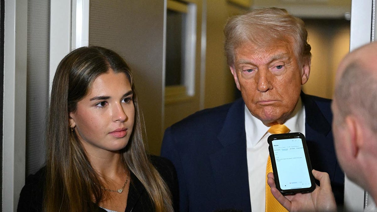 Trump and granddaughter Kai