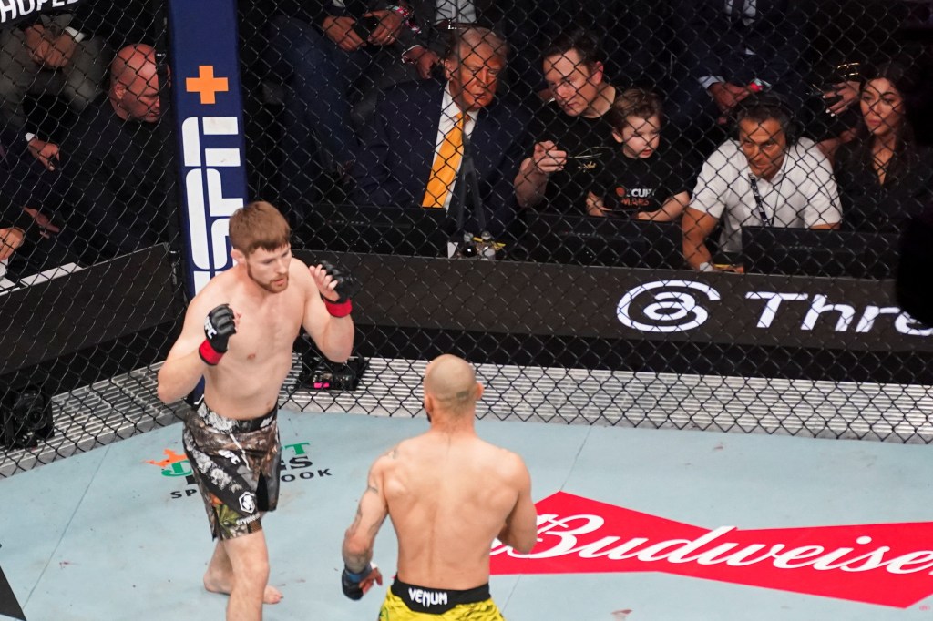 U.S President Donald Trump and Elon Musk with son, along with Dana White watching UFC 314 bout between Bryce Mitchell and Jean Silva in Miami, Florida