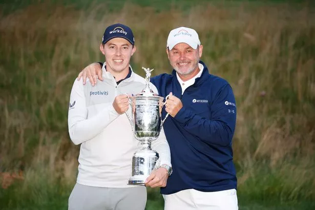 Matt Fitzpatrick celebrates winning the US Open with Billy Foster in 2022