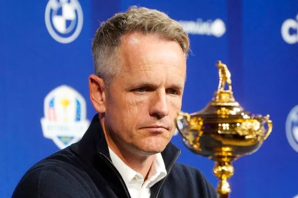 Luke Donald of England speaks at a press conference 