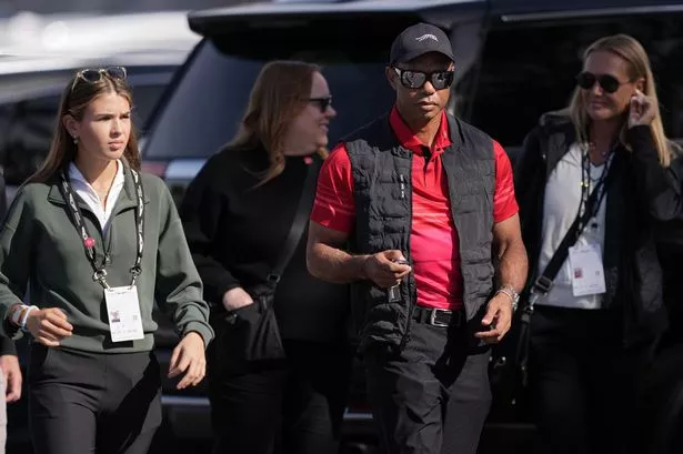 Tiger Woods was spotted alongside Kai Trump and Vanessa Trump (back right) last month