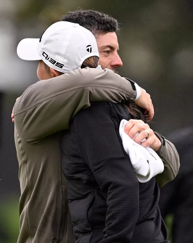 Kai Trump and Rory McIlroy of embrace on the ninth green prior to The Genesis Invitational 2025 at Torrey Pines Golf Course 