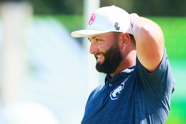 Captain Jon Rahm of Legion XIII warms up on the practice green during day one of the LIV Golf Invitational