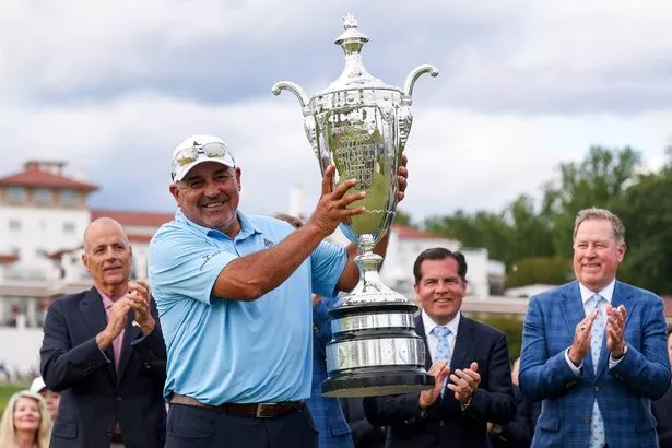 Angel Cabrera lifting the Alfred S. Bourne Trophy