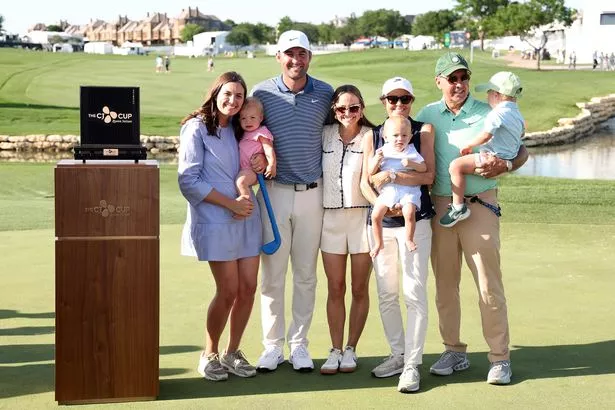 Scottie Scheffler of the United States celebrates with his family after winning THE CJ CUP Byron Nelson 2025 at TPC Craig Ranch on May 04, 2025 in McKinney, Texas.