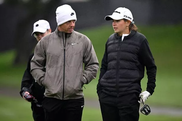 Rory McIlroy of Northern Ireland and Kai Trump