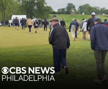 Golfers, fans brave rainy weather during day 2 of Truist Championship at Philadelphia Cricket Club