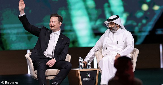 Tesla CEO Elon Musk sits with Saudi Minister of Communications and Information Technology Abdullah Alswaha, at the Saudi-U.S. Investment Forum, in Riyadh, Saudi Arabia, May 13, 2025. REUTERS/Hamad I Mohammed