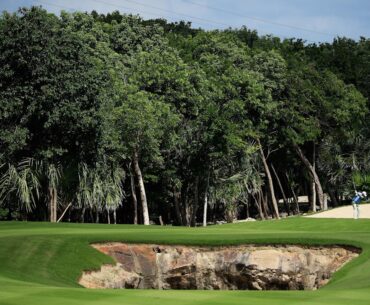 What's the deal with that giant hole in the middle of the fairway for LPGA tournament?