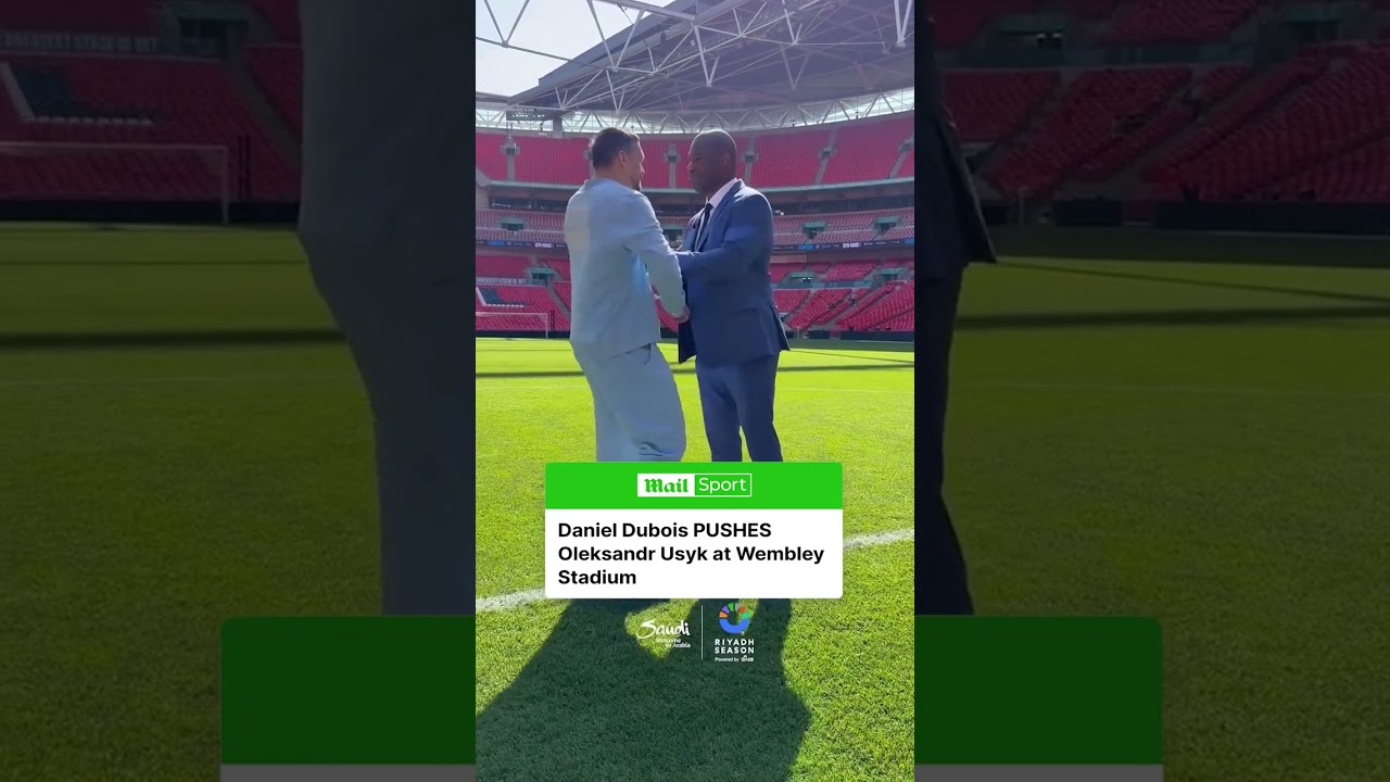 Daniel Dubois SHOVES Oleksandr Usyk as the pair faced off at Wembley Stadium ahead of their Daniel Dubois SHOVES Oleksandr Usyk as the pair faced off at Wembley Stadium ahead of their