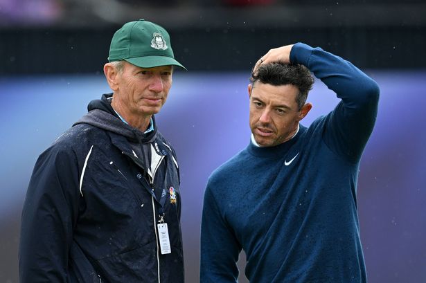 TROON, SCOTLAND - JULY 16: Rory McIlroy of Northern Ireland interacts with his putting coach, Brad Faxon during a practice round prior to The 152nd Open championship at Royal Troon on July 16, 2024 in Troon, Scotland. (Photo by Stuart Franklin/R&A/R&A via Getty Images)