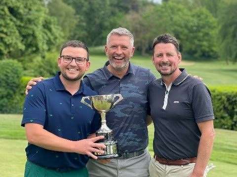 Club captain Lee Russell flanked by Matt Farlie and Nick Clardon, winners of the HMP Foursomes. Picture: Linda Alexander