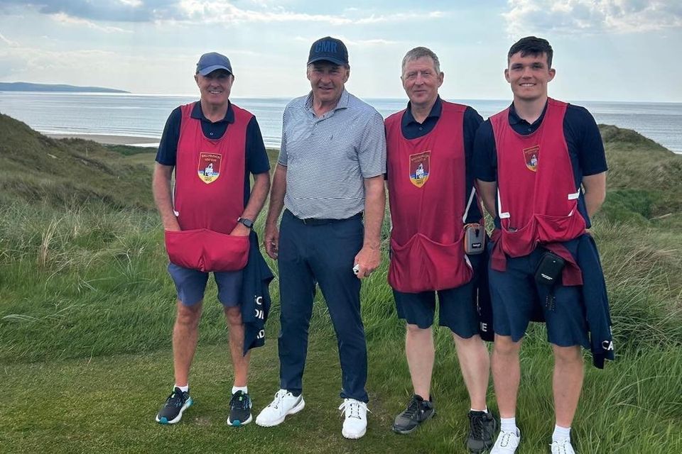 Sir Nick Faldo pictured with some of the caddies from Ballybunion Golf Club on Monday. 