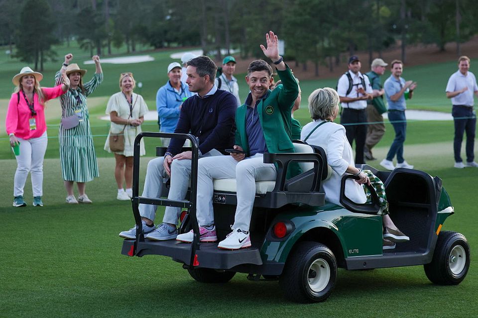 Rory McIlroy and manager Seán O'Flaherty after the Masters win on April 13 last. Photo: Getty 