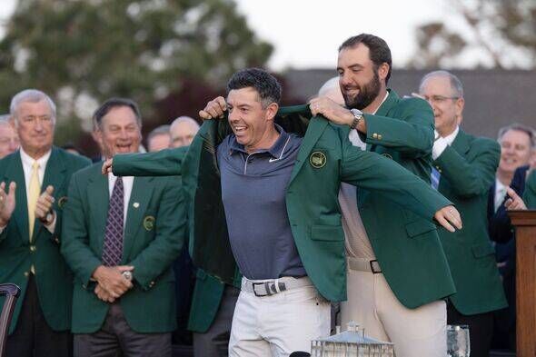Rory McIlroy tries on the green jacket