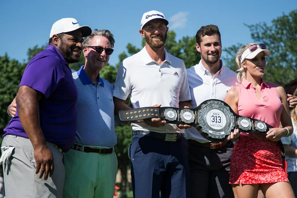 From left, Winner of the AREA 313 Celebrity Challenge Team DJ members Jerome Bettis, Dustin Johnson, Dylan Larkin and Paige Spiranac pose for a photo with Larry Burns, president and CEO of Children's Hospital of Michigan Foundation.
06252019 Pga Celebritychallenge 31