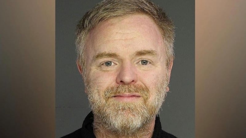 Businessman Alan Redmond handed out hundreds of thousands in donations through charity after alleged US insurance scam