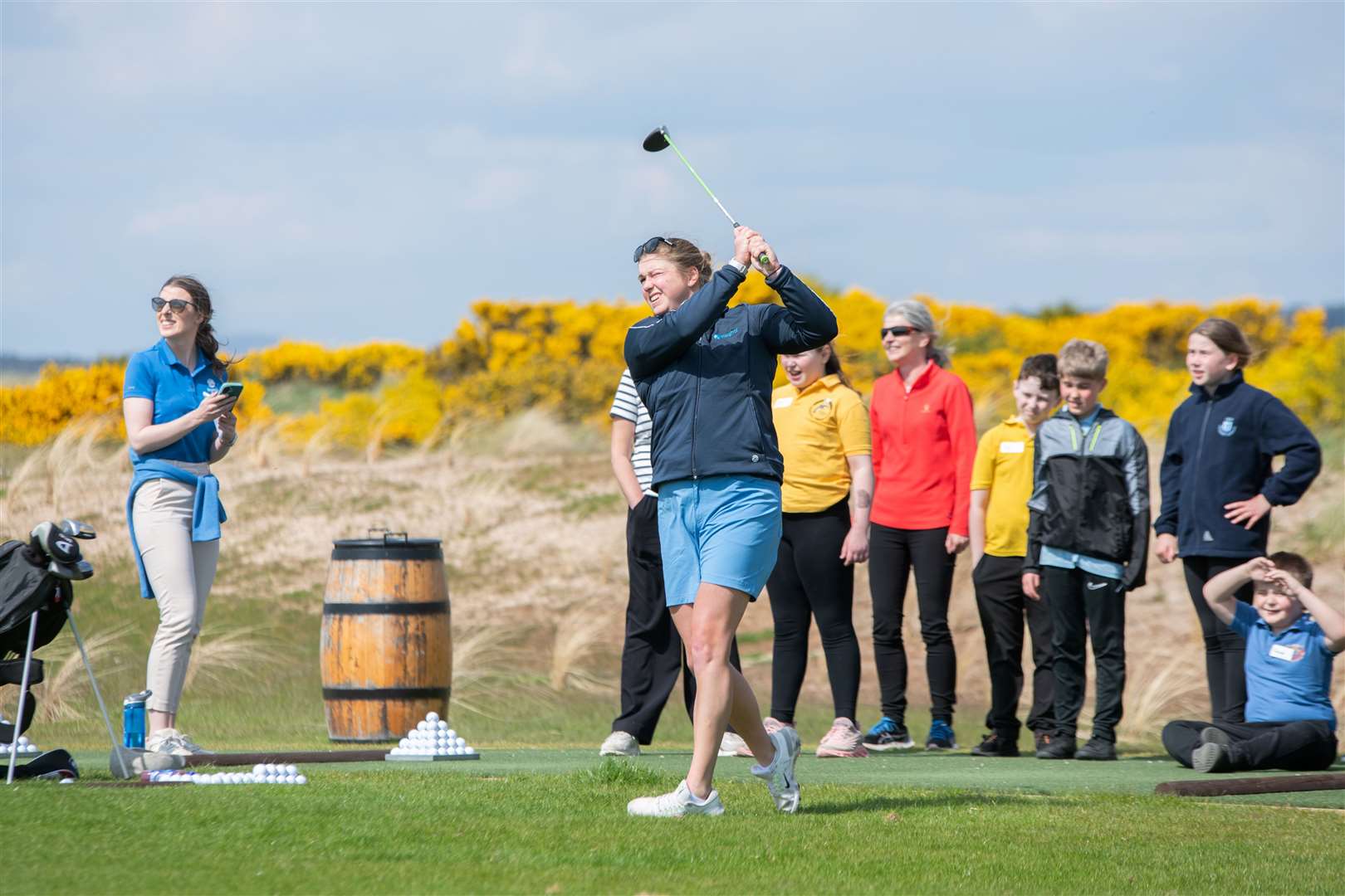 Getting shown how it's done at the Primary School's Golf Skills Challenge day at Castle Stuart Golf Course. Picture: Daniel Forsyth.