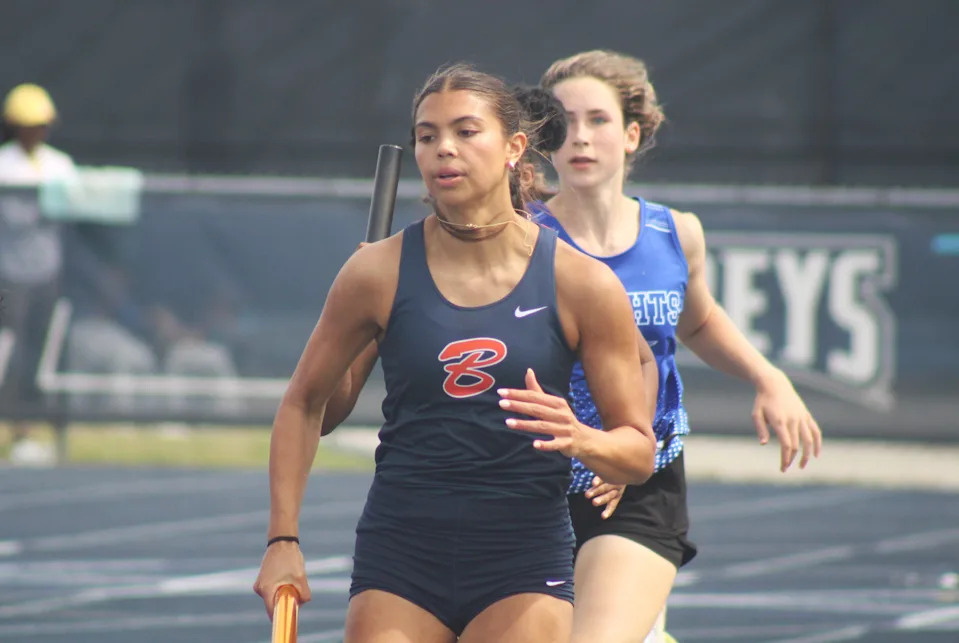 Sam Woods of Benjamin races in the girls 4x400 relay during the FHSAA Class 1A high school track and field championships on May 10, 2025.