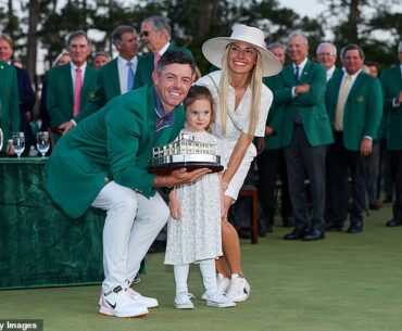 Rory McIlroy poses with wife Erica and daughte Poppy after winning the Masters in April