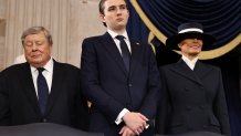 WASHINGTON, DC - JANUARY 20: (L-R) Viktor Knavs, Barron Trump and Melania Trump attend the inauguration of U.S. President-elect Donald Trump in the Rotunda of the U.S. Capitol on January 20, 2025 in Washington, DC. Donald Trump takes office for his second term as the 47th president of the United States. (Photo by Chip Somodevilla/Getty Images)