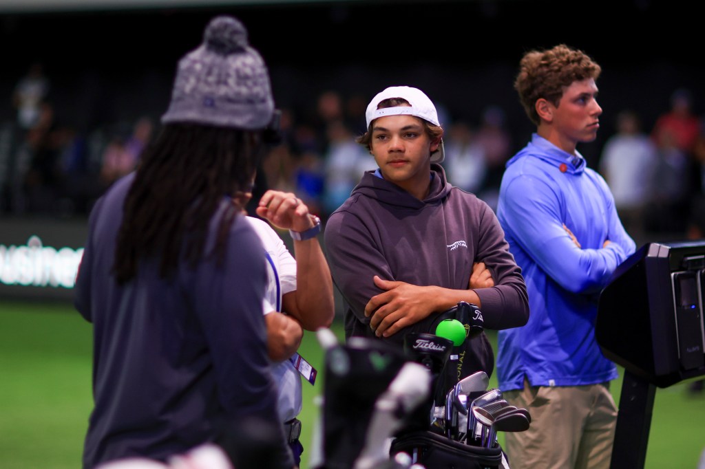 Charlie Woods, son of Tiger Woods of Jupiter Links Golf Club, looks on before a TGL presented by SoFi match between Jupiter Links Golf Club and New York Golf Club at SoFi Center on February 18, 2025 in Palm Beach Gardens, Florida. 