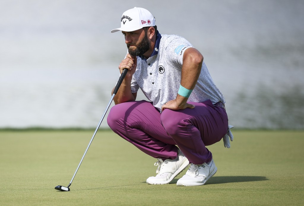 Jon Rahm, who is 6-under and tied for fifth, lines up a putt on the 17th hole during the third round of the PGA Championship.