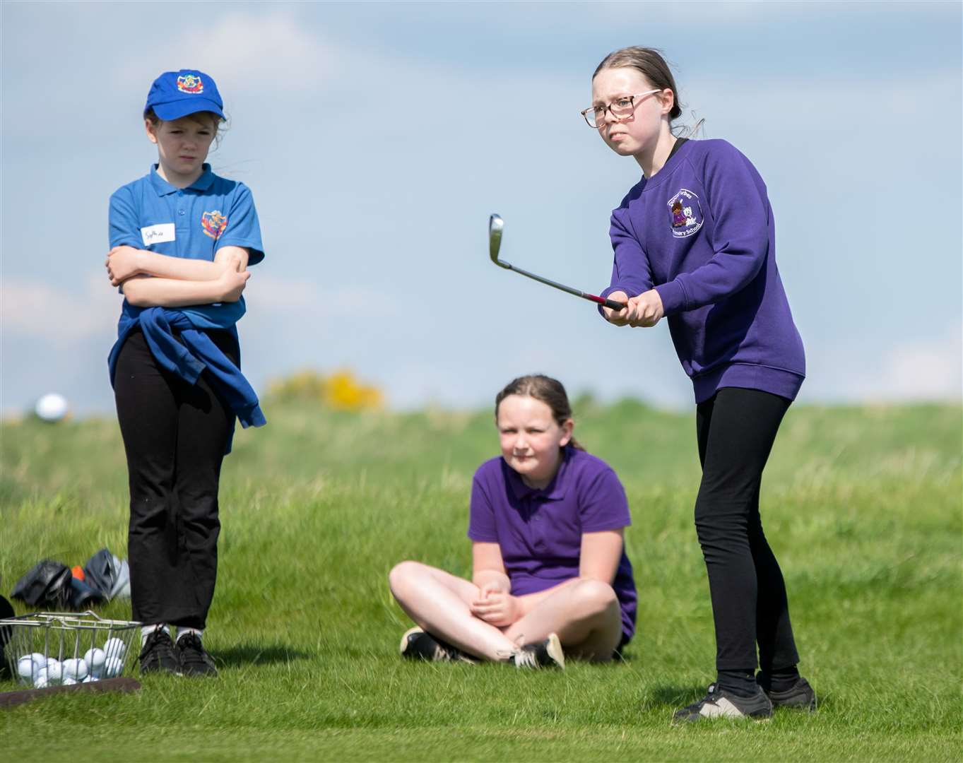 Duncan Forbes Primary School pupil tries their hand at chipping. Primary School's Golf Skills Challenge day at Castle Stuart Golf Course. Picture: Daniel Forsyth.
