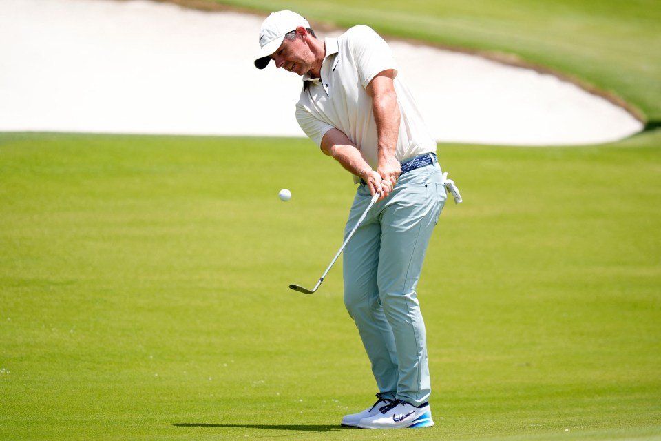 May 18, 2025; Charlotte, North Carolina, USA; Rory McIlroy takes a shot on the 15th hole during the final round of the PGA Championship golf tournament at Quail Hollow. Mandatory Credit: Jim Dedmon-Imagn Images