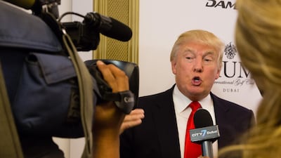 Donald Trump speaks to the media at the launch of Damac's Akoya project, which includes his Trump International golf course, in 2014. Duncan Chard for The National
