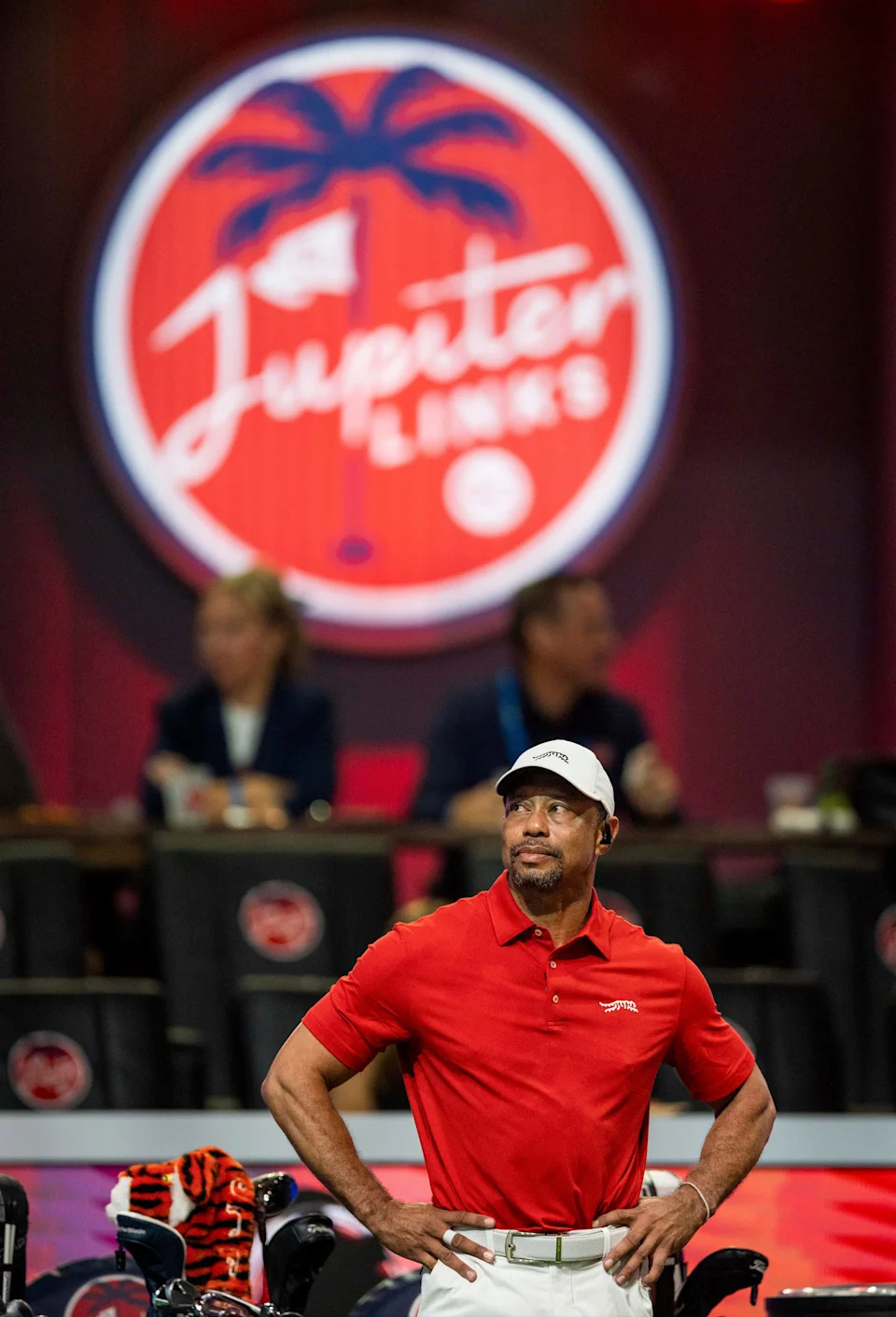 Tiger Woods of Jupiter Links GC watches a teammate tee off during a TGL match against Atlanta Drive GC at SoFi Center on March 4, 2025, in Palm Beach Gardens, Florida.