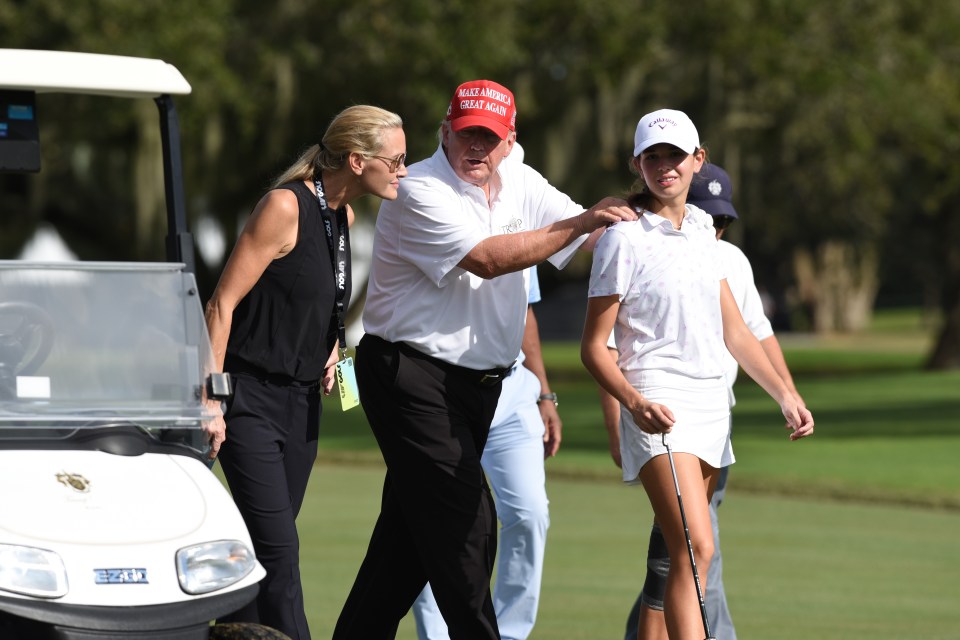 Donald Trump walking with his niece and her mother at a golf tournament.
