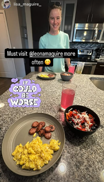 Woman in kitchen with breakfast food.
