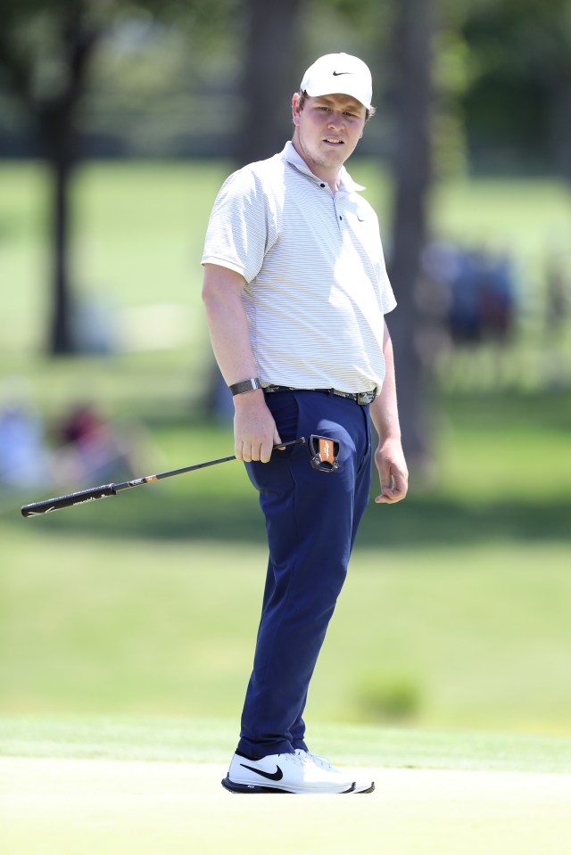 Robert MacIntyre of Scotland watches his putt.