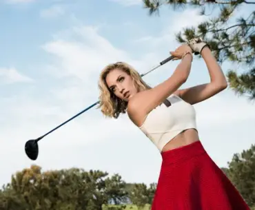 Paige Spiranac brings bold energy in fitted red look at Grass League golf event image