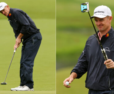 Justin Rose hits a putt and lifts the putter up to the crowd