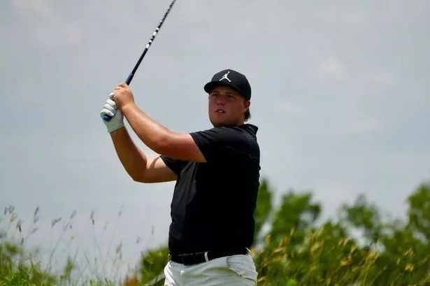 Phillip Dunham partnered Charlie Woods during the son of Tiger's landmark win
