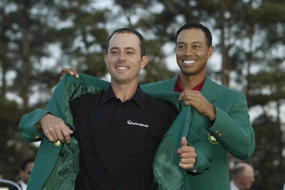Mike Weir got his green jacket from defending champ Tiger Woods in 2003.