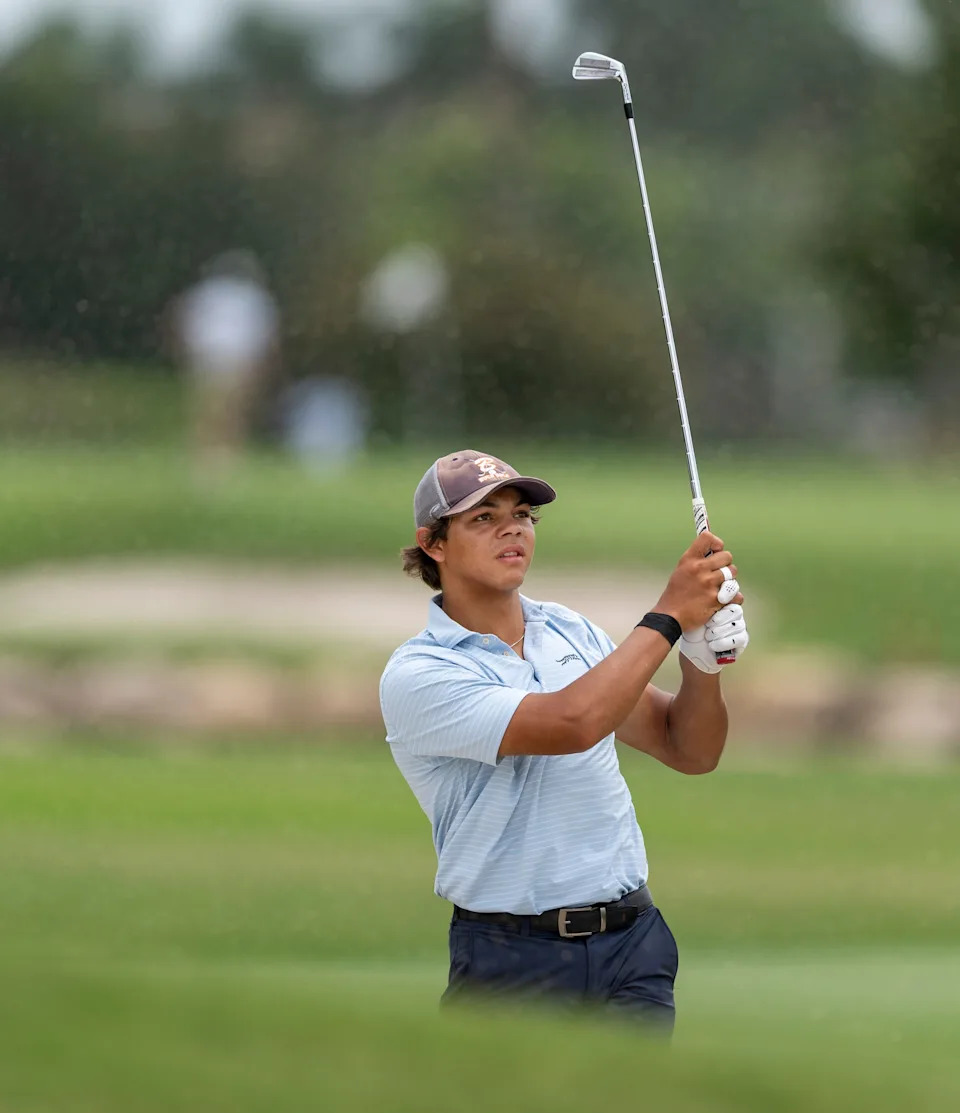 Charlie Woods hits out of a fairway bunker during the first round of the108th Amateur Championship at BallenIsles Country Club on June 5, 2025, in Palm Beach Gardens, Florida.