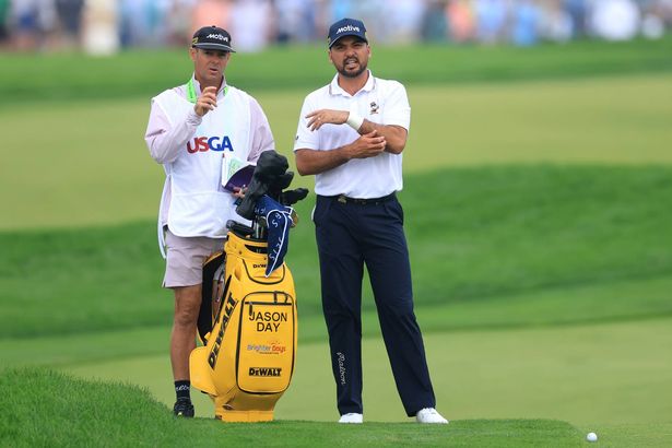Jason Day with his caddie Luke Reardon