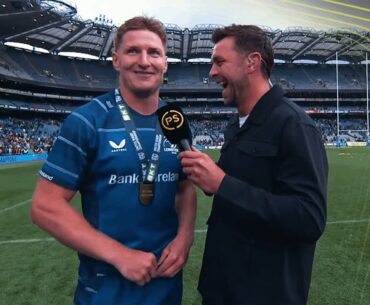 Ryan Wilson chats to victorious Leinster players after URC Grand Final at Croke Park
