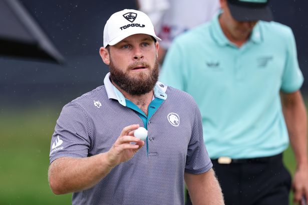 Tyrrell Hatton of England reacts to his putt on the 13th green during the final round of the 125th U.S. OPEN